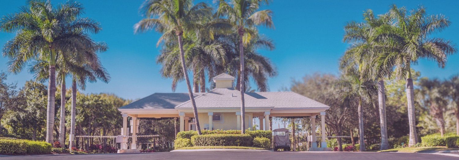 gate house in front of south florida community